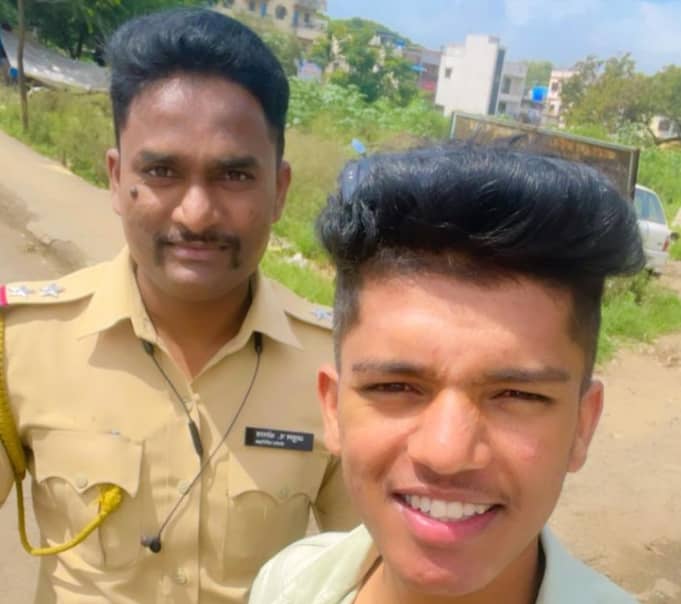 Akash Jadhav with an Indian Police