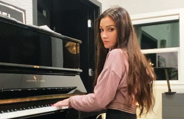 Kristina Basham playing Piano