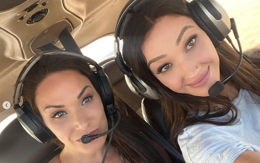Kristina Basham and her friend flying a private jet