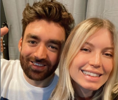 Anabel Englund taking with musician Oliver Heldens