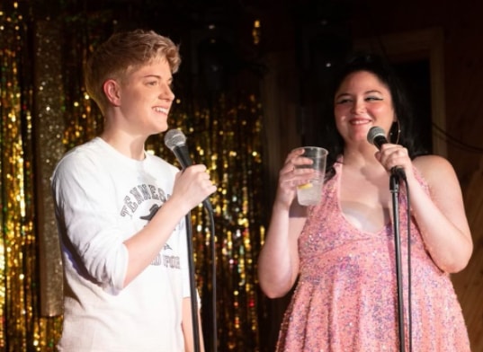 Megan Stalter with comedian Mae Martin at a stand-up comedy show