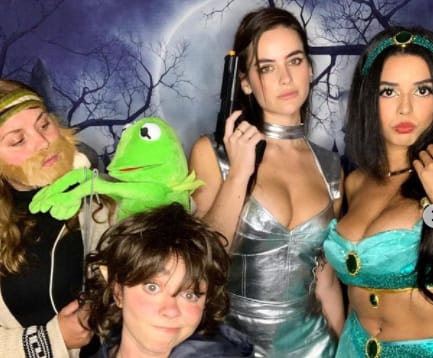 Sarah Hyland with others in Halloween dress