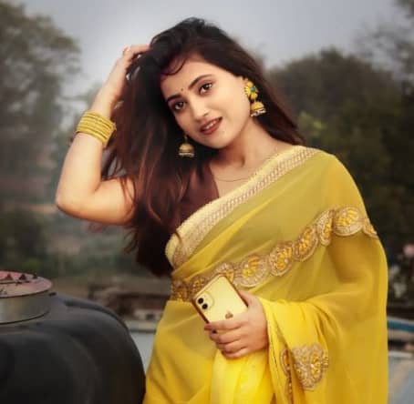 Ankita Mishra looking nice in a yellow saree.