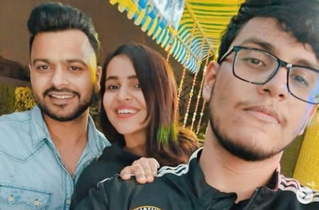 Harsh Gupta with his wife and a friend