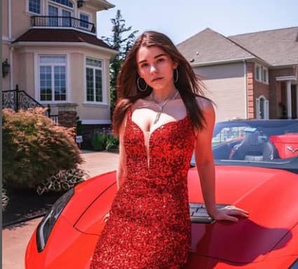 Nikki Woods has a red car.