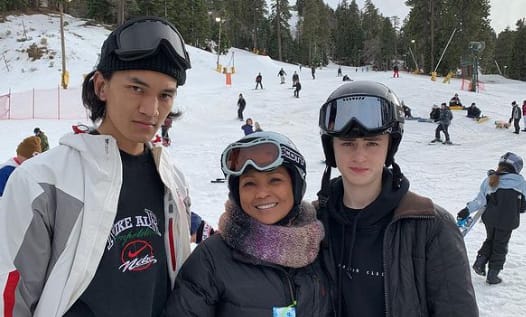 Jaeden Martell with his mom and sibling