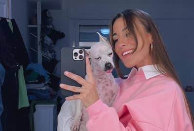 Paula Gonu and her pet dog Coco
