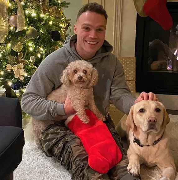 Max Domi with his pet dogs 