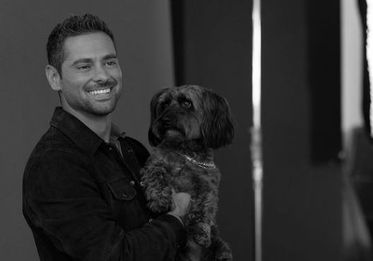 J.R. Ramírez and pet dog 