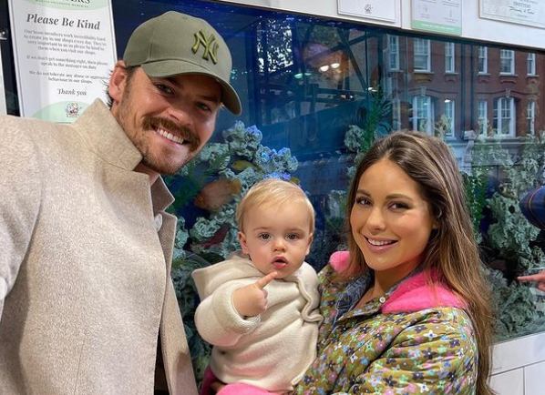 Louise Thompson with her husband and son